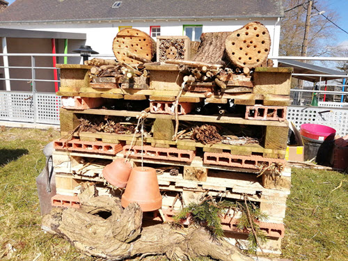 insect hotel made from recycled objects and pallets